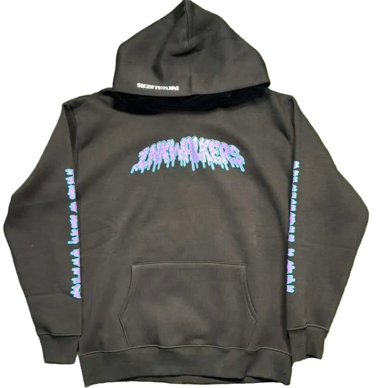 Black hoodie with colorful graphics on a green grass background