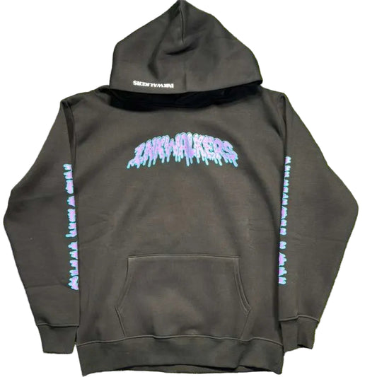 Black hoodie with colorful graphics on a green grass background